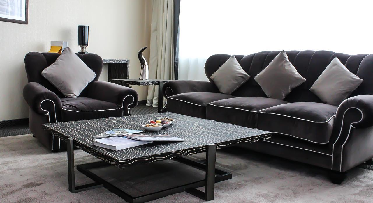 Grand Mogador City Center Casablanca Exteriér fotografie A living room